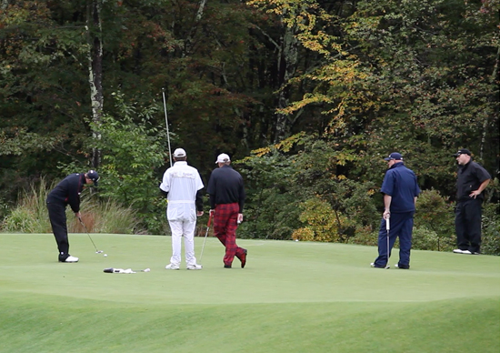 Frederick W. showing his perfect putting form.
