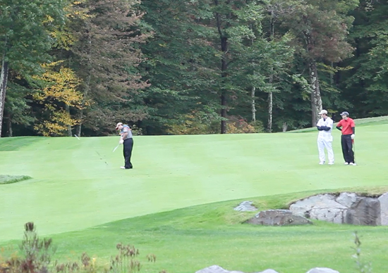 Chris hitting his approach on the Par-5 18th.