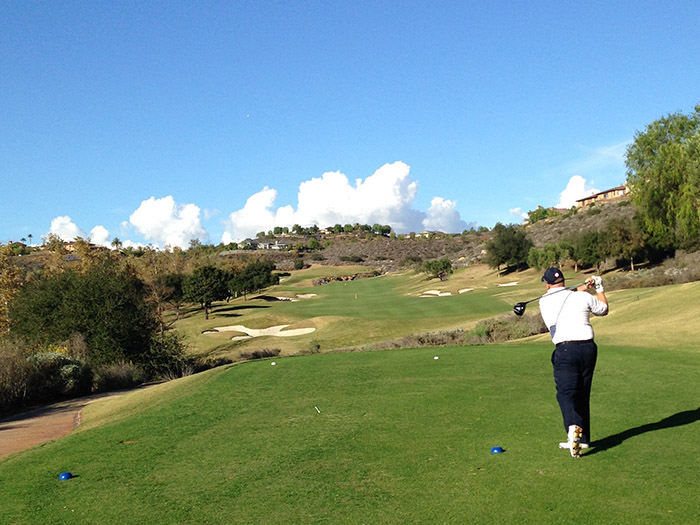 Marc splits the fairway on the uphill par-4.