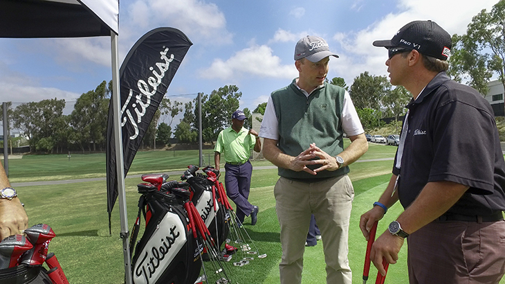 Mike talking putters with Team Titleist member...