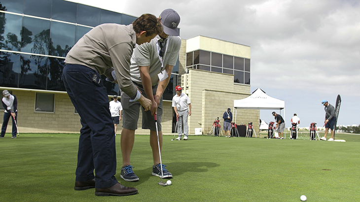 Spencer works with Team Titleist member Russ. 
