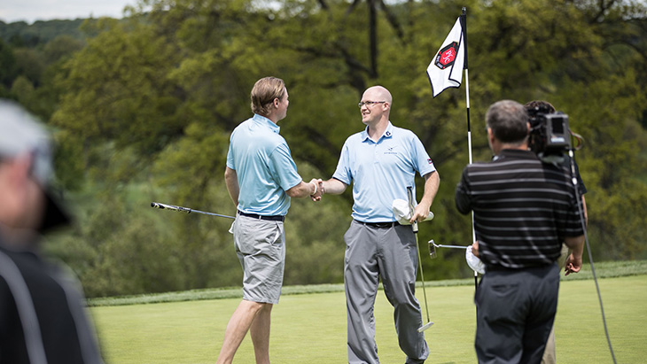 All smiles for Team Titleist members Dave Weber...