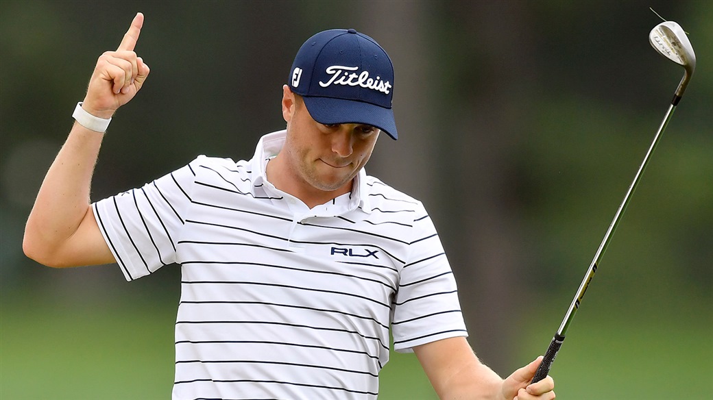 Justin Thomas raises his Vokey SM& wedge after chipping in for birdie at the 2019 BMW Championship