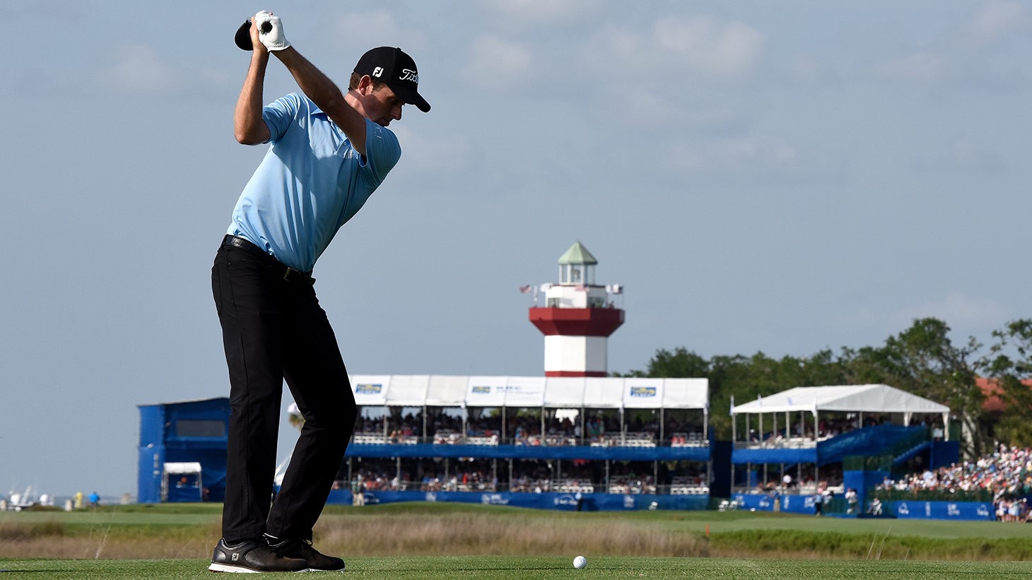 Webb Simpson tees off on the 18th hole at Harbour Town Golf Links